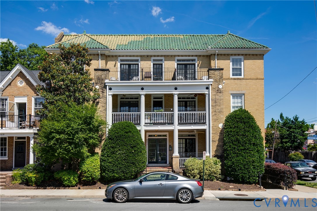 Multi-story brick building featuring a distinctive