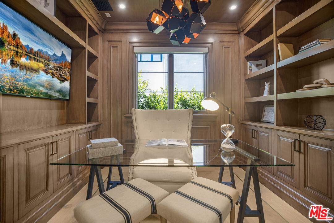 843 North Spaulding Avenue Los Angeles, CA 90046 - Photo 11 of 24 a living room with a couch and a large window