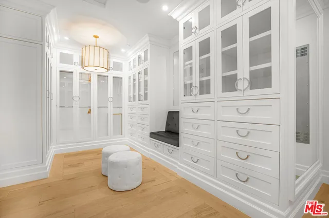 a bathroom with a shower sink vanity granite and shower