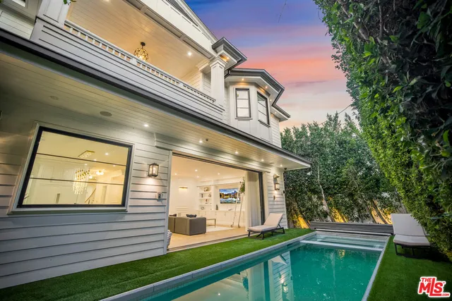 a view of a house with a large window