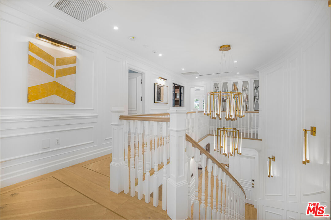 843 North Spaulding Avenue Los Angeles, CA 90046 - Photo 22 of 24 a view of staircase with white walls and windows