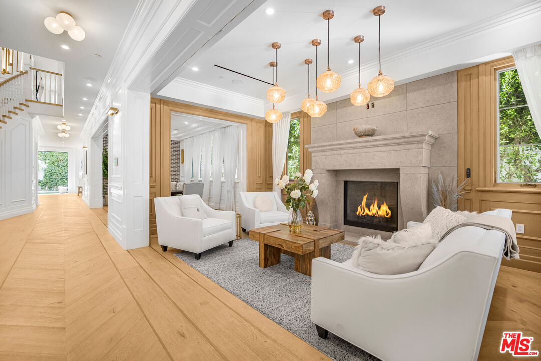 843 North Spaulding Avenue Los Angeles, CA 90046 - Photo 5 of 24 a living room with furniture and a fireplace