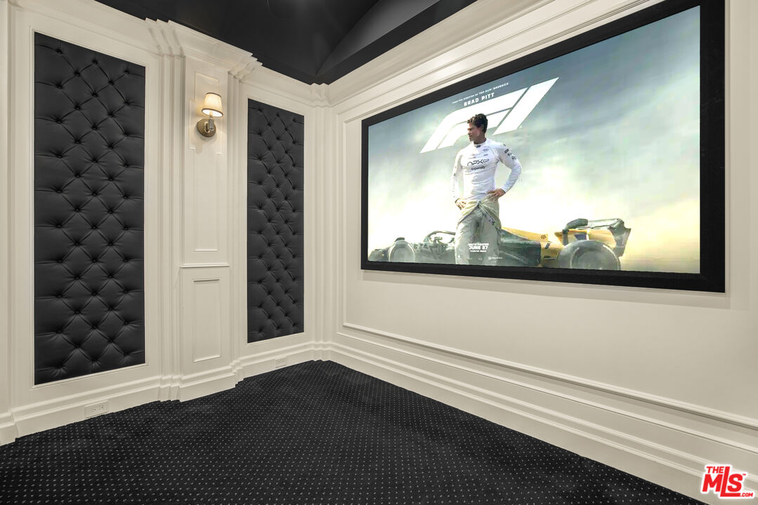 843 North Spaulding Avenue Los Angeles, CA 90046 - Photo 8 of 24 a view of a room with wooden floor and window