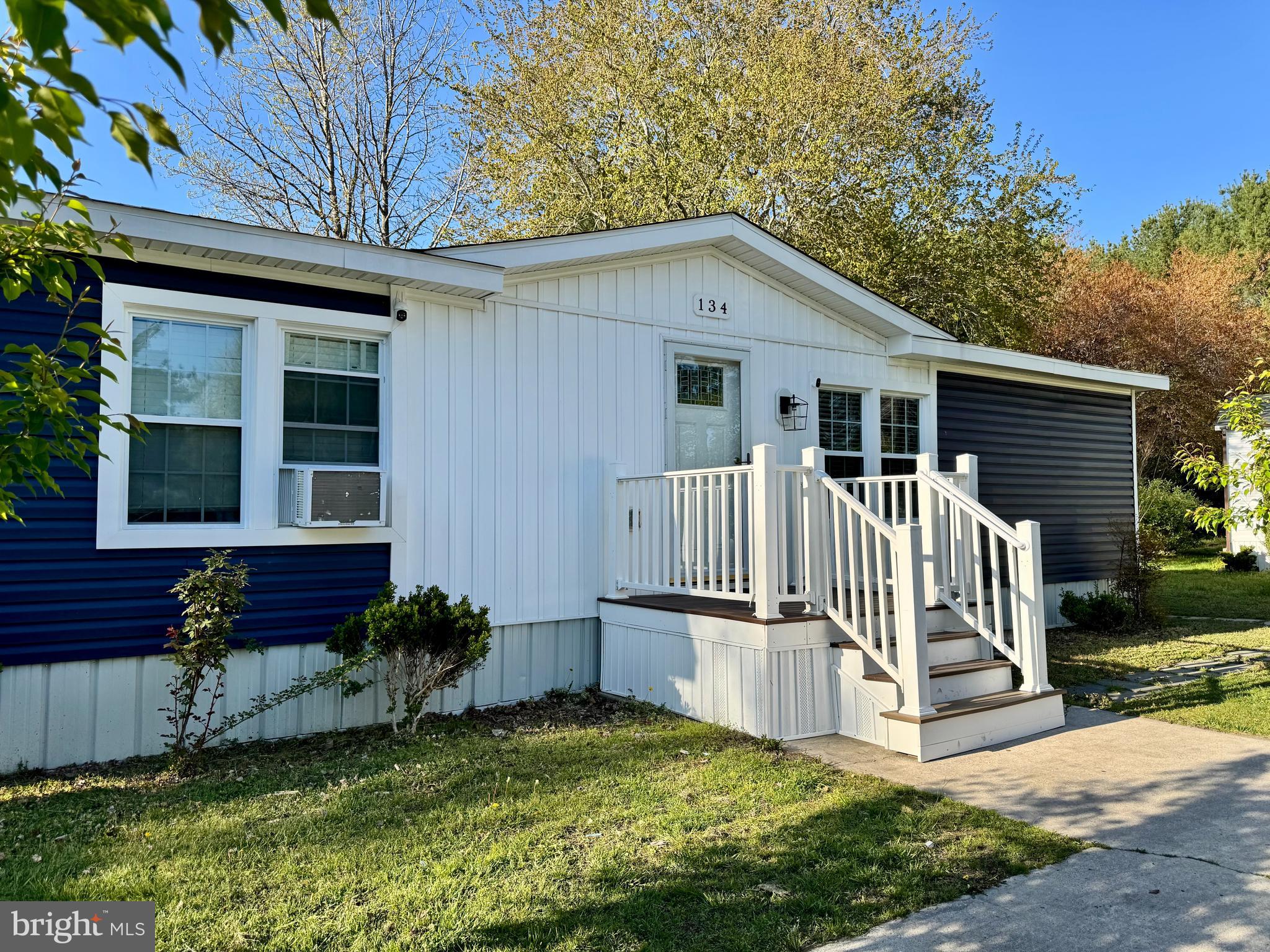 134 Liberty Way Fruitland, MD 21826 - Photo 2 of 25 a view of a house with a yard and deck