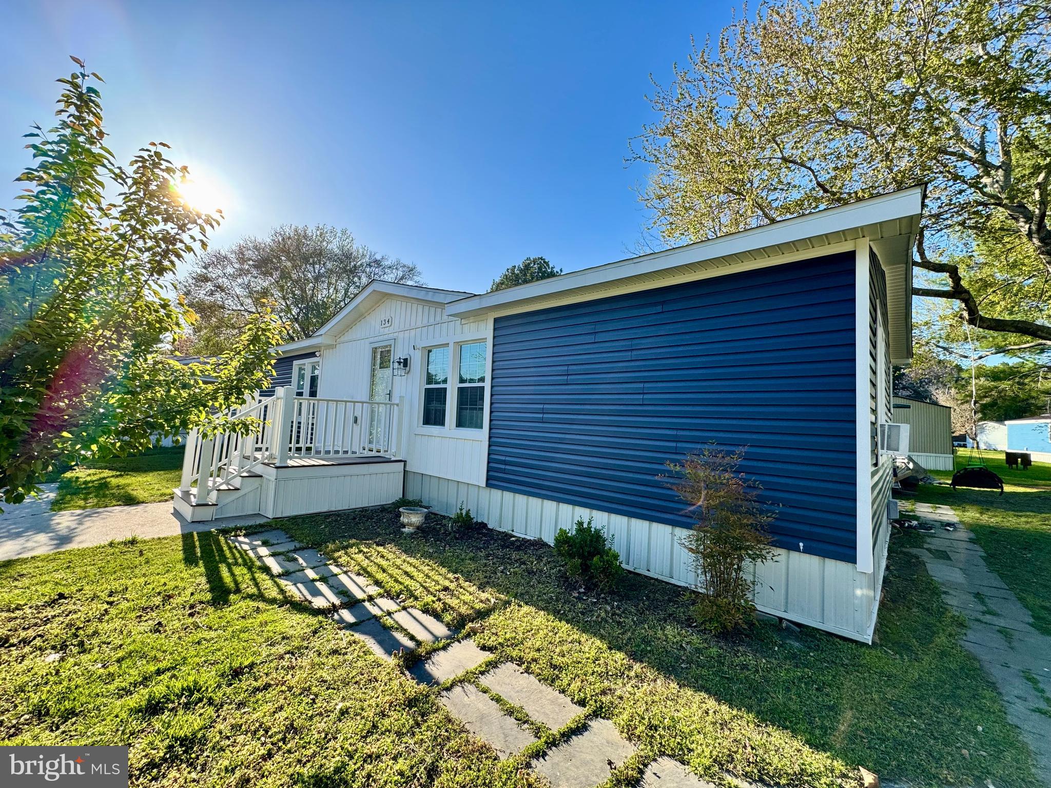 134 Liberty Way Fruitland, MD 21826 - Photo 5 of 25 a front view of a house with a yard