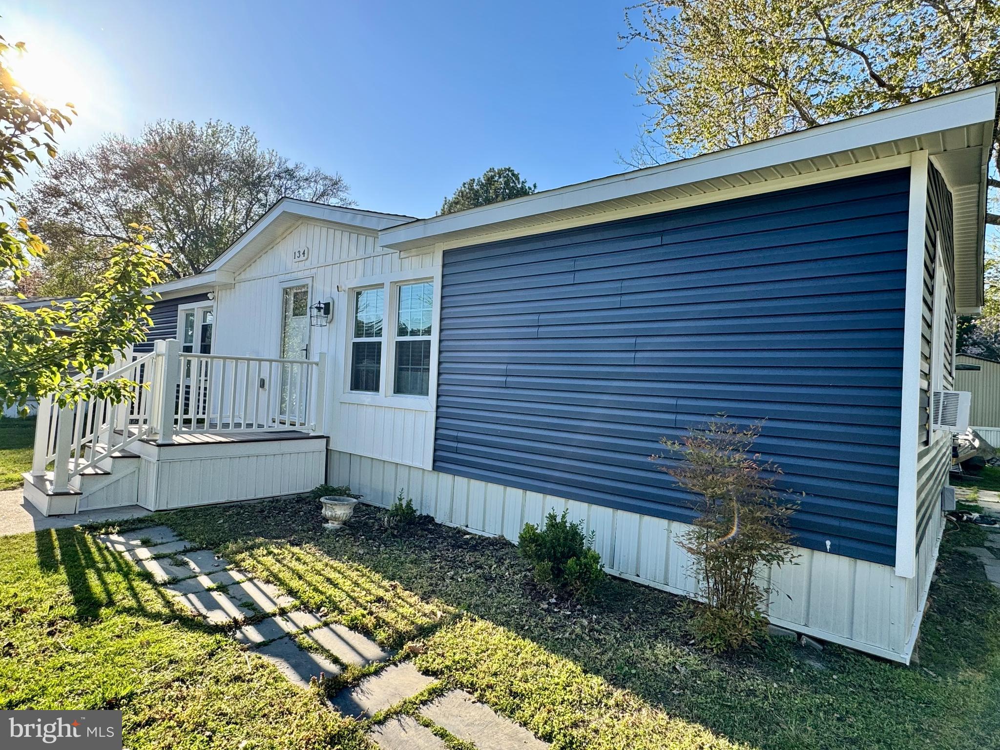 134 Liberty Way Fruitland, MD 21826 - Photo 6 of 25 a front view of a house with garden