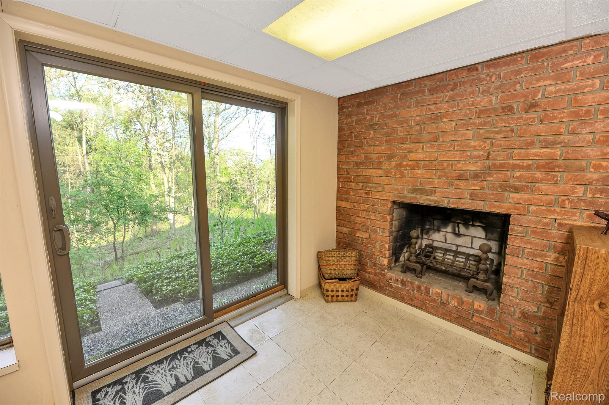 5784 Thorny Ash Road Rochester, MI 48306 - Photo 56 of 60 Walkout Doorwall & Fireplace in Basement