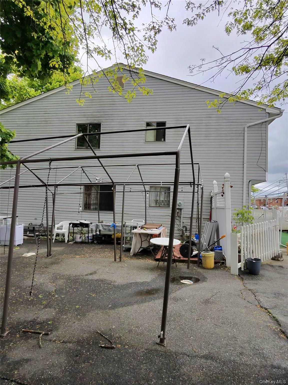 22 Slinn Avenue Spring Valley, NY 10977 - Photo 11 of 11 a view of a garage with furniture