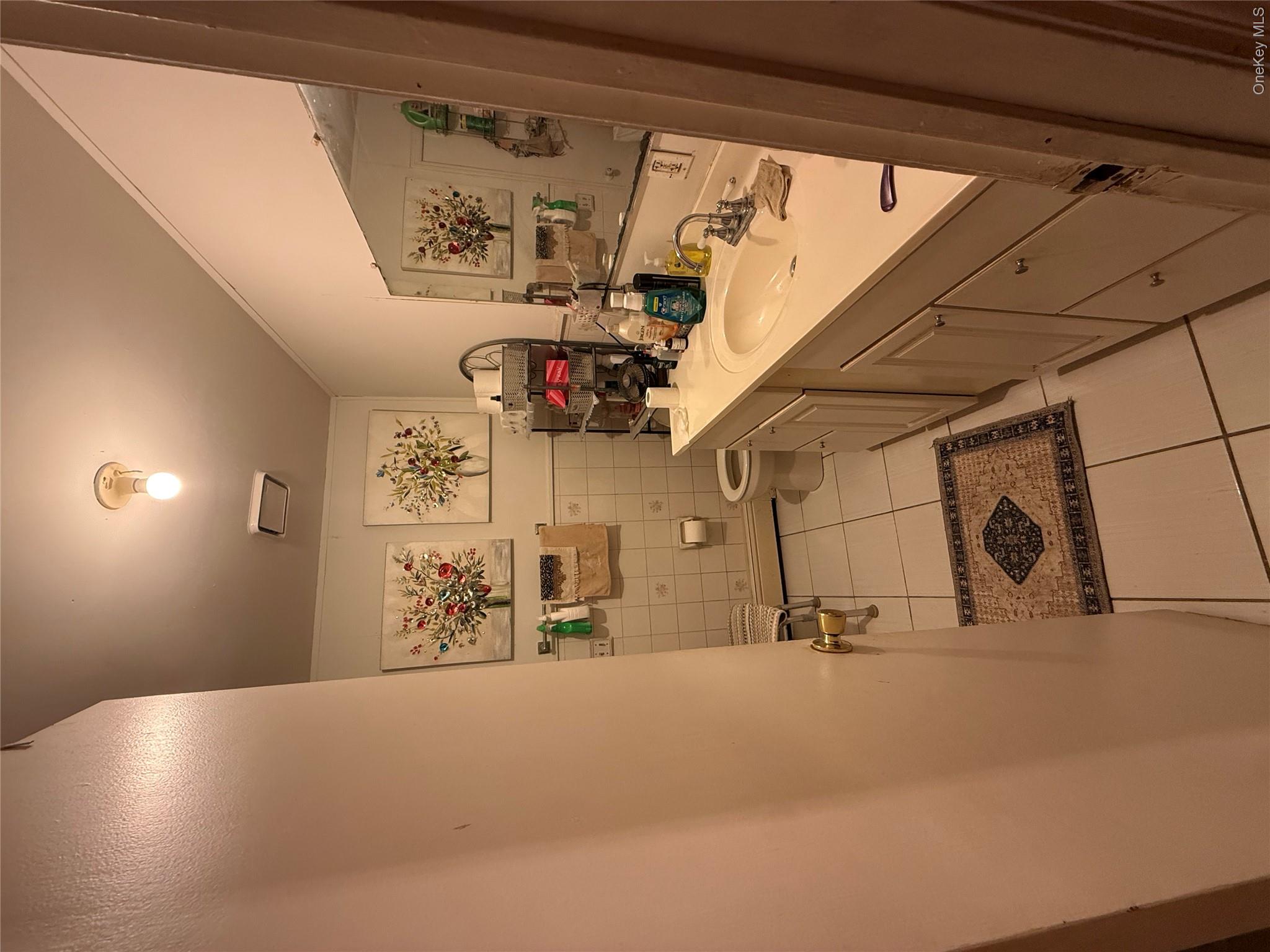 22 Slinn Avenue Spring Valley, NY 10977 - Photo 2 of 11 a view of utility room with washer and dryer