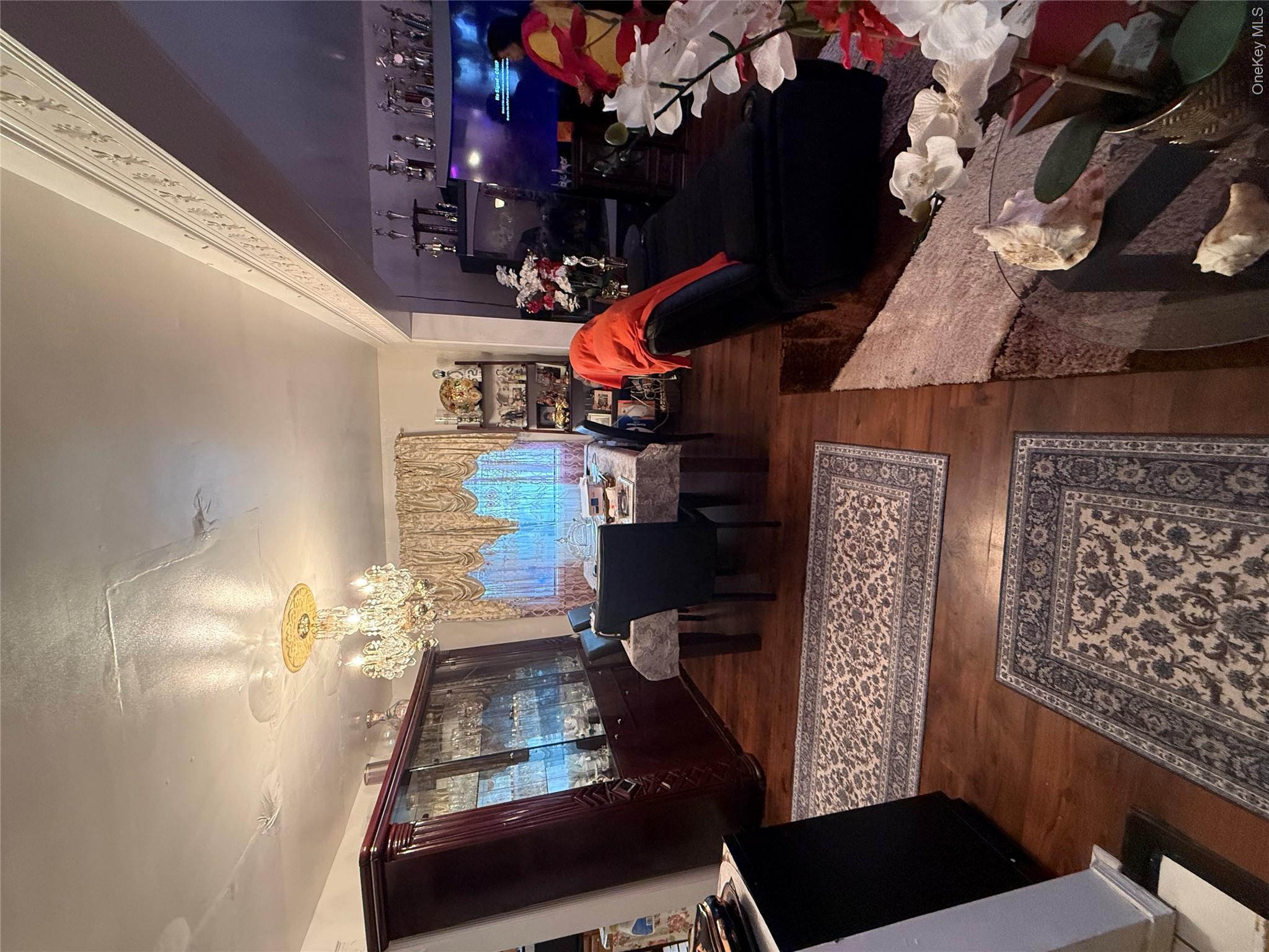 22 Slinn Avenue Spring Valley, NY 10977 - Photo 3 of 11 a living room with furniture and a fireplace