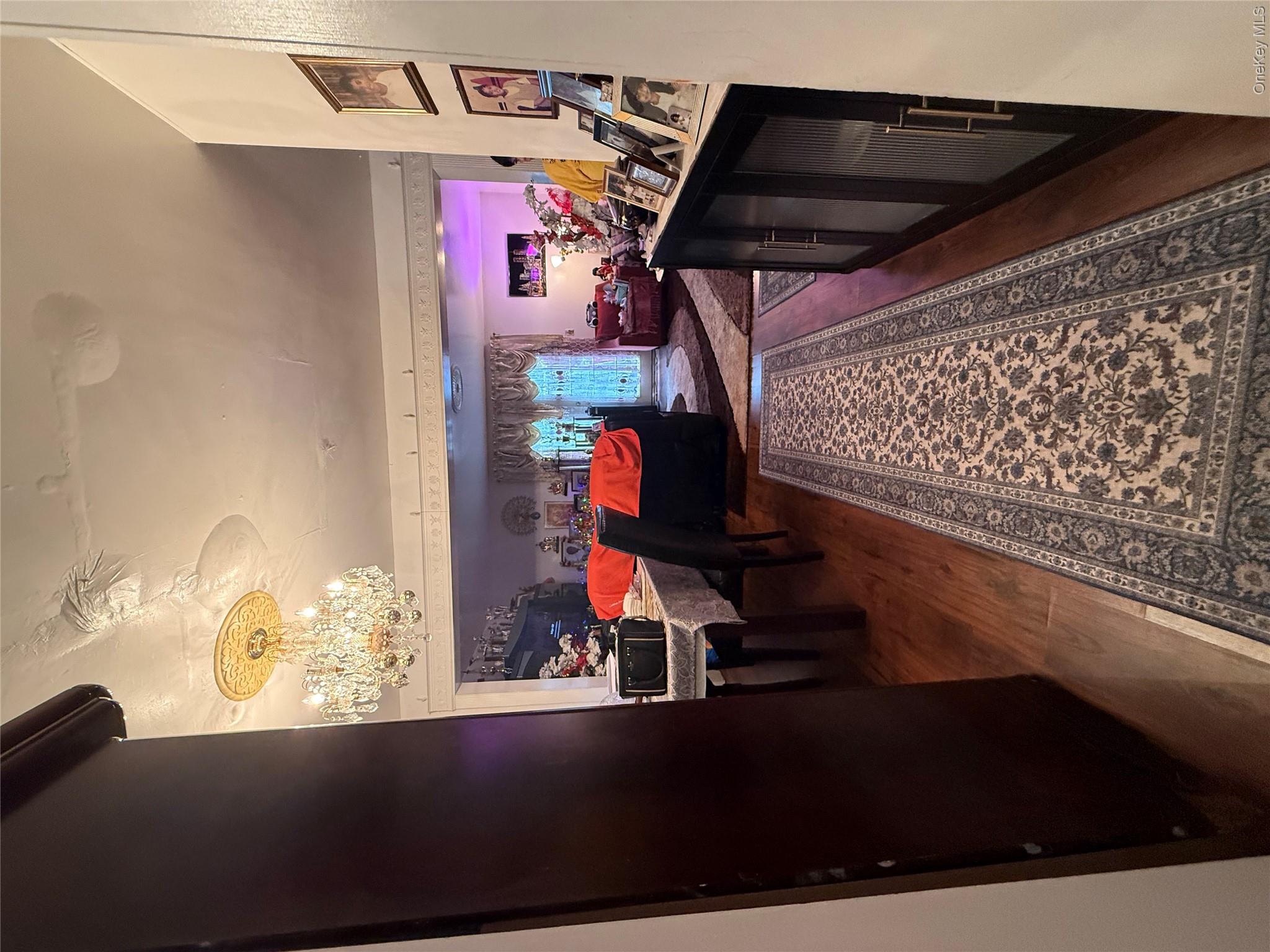 22 Slinn Avenue Spring Valley, NY 10977 - Photo 6 of 11 a living room with furniture and a fireplace
