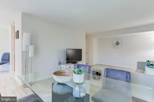 a close view of a utility room with dryer and washer