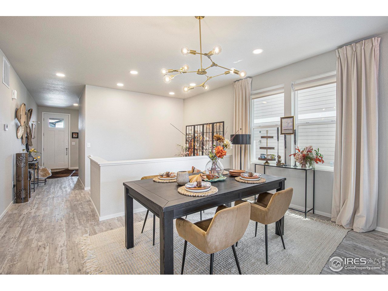 6618 4th St Road Greeley, CO 80634 - Photo 7 of 21 Dining area and hallway to Front Door