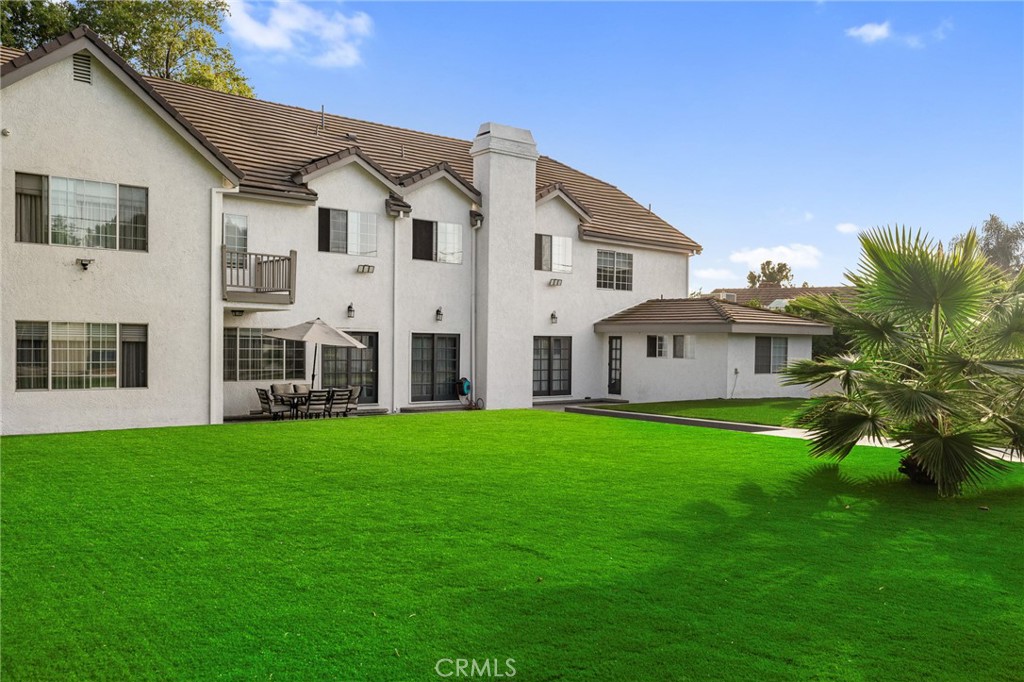 17153 Rayen Street Northridge, CA 91325 - Photo 16 of 75 a view of a yard in front of house