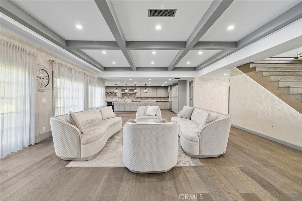 17153 Rayen Street Northridge, CA 91325 - Photo 29 of 75 a living room with couches and a large window