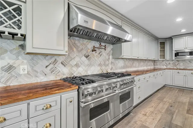 an empty room with windows and natural light