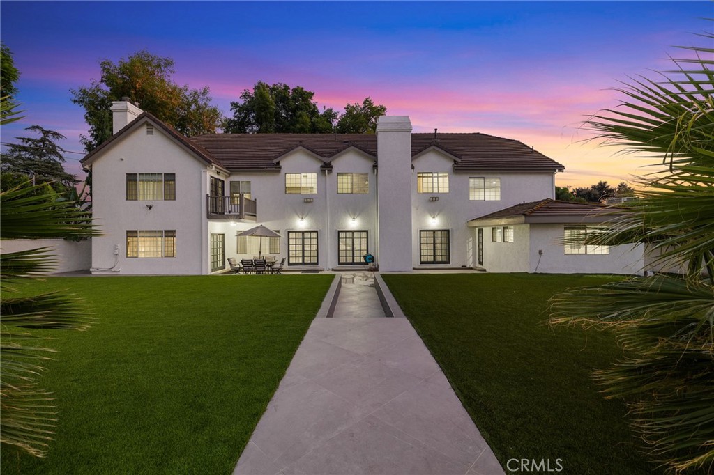 17153 Rayen Street Northridge, CA 91325 - Photo 4 of 75 a view of house with a yard
