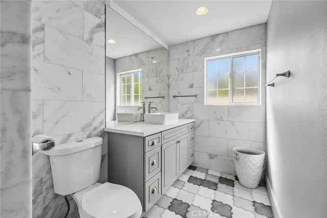 a white bath tub sitting next to a window