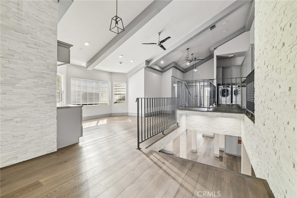 17153 Rayen Street Northridge, CA 91325 - Photo 49 of 75 a view of entryway and hall with wooden floor
