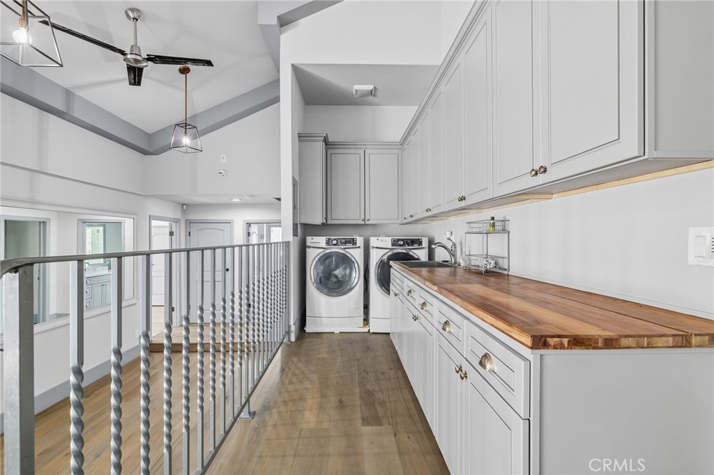 17153 Rayen Street Northridge, CA 91325 - Photo 63 of 75 a kitchen with a sink and cabinets