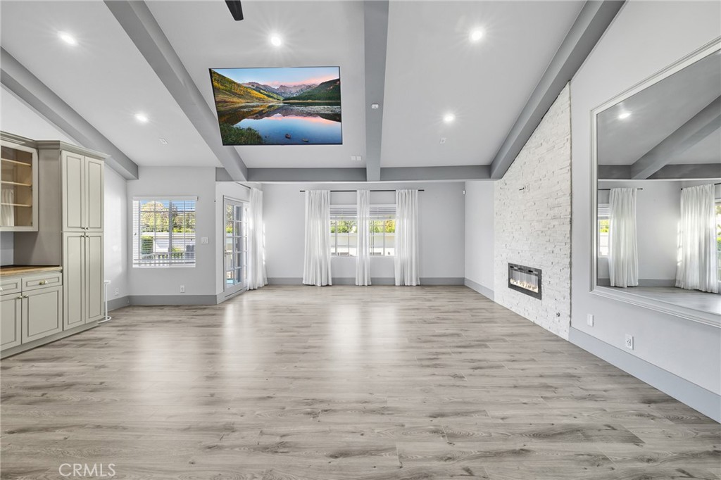 17153 Rayen Street Northridge, CA 91325 - Photo 65 of 75 a view of an entryway with wooden floor