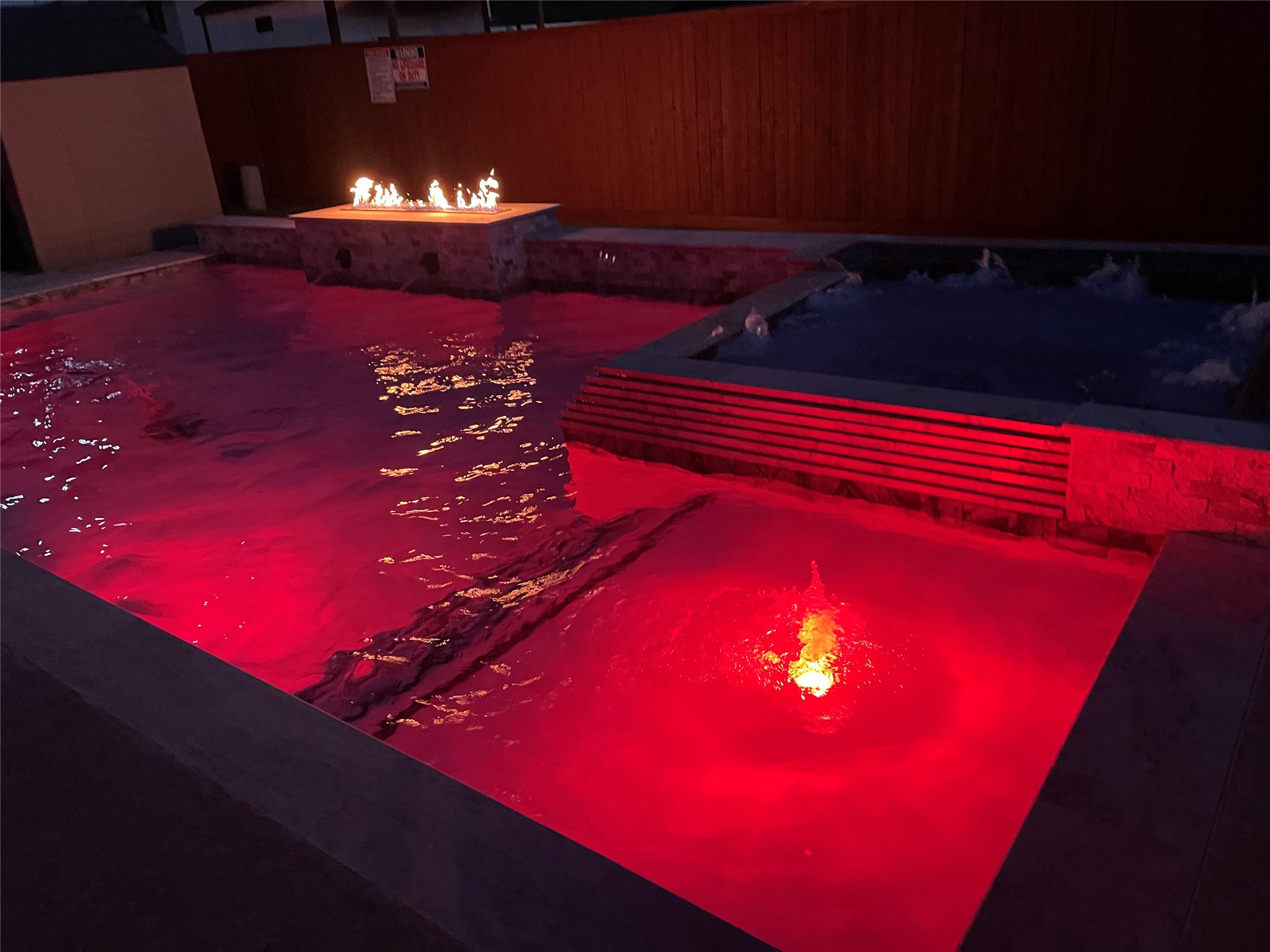 1923 Kaitlyn Drive Houston, TX 77049 - Photo 16 of 22 a blue swimming pool with outdoor seating