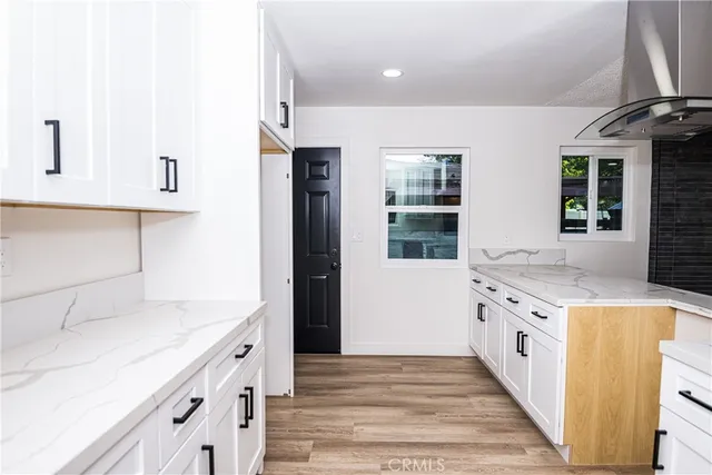 a bathroom with a sink and a shower