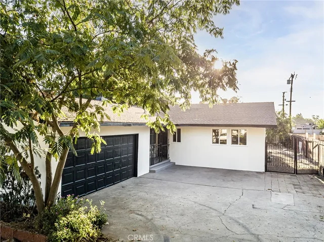 an aerial view of residential building with ocean view