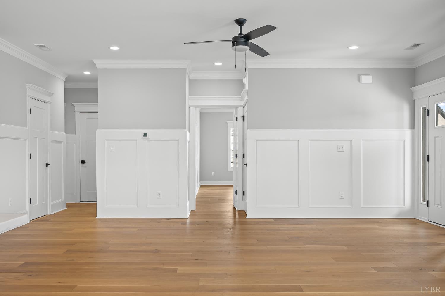 1034 North Westyn Loop Forest, VA 24551 - Photo 15 of 57 a view of empty room with wooden floor and ceiling fan