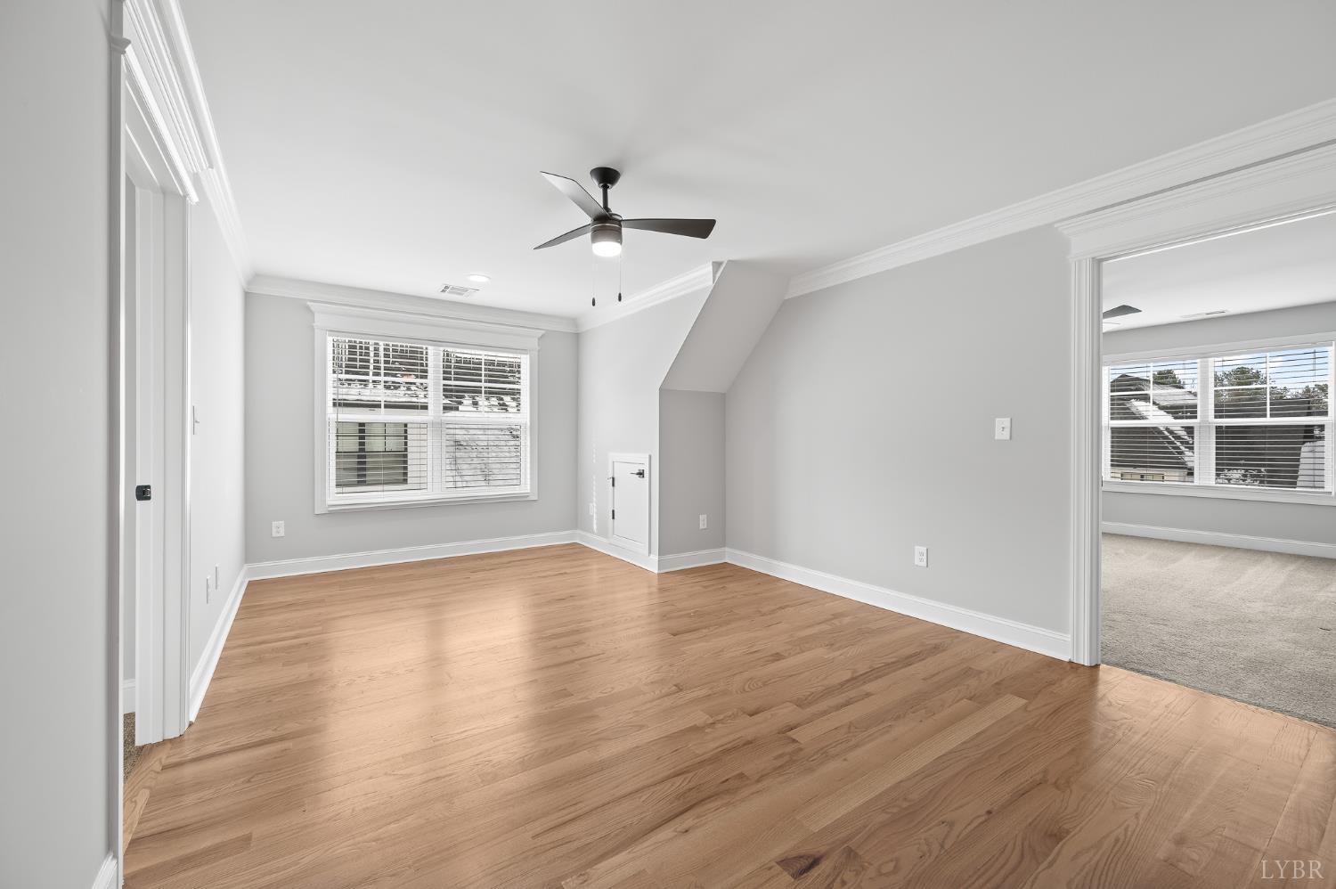 1034 North Westyn Loop Forest, VA 24551 - Photo 27 of 57 a view of an empty room with window and wooden floor