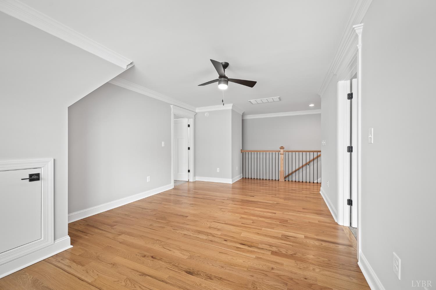 1034 North Westyn Loop Forest, VA 24551 - Photo 29 of 57 a view of a livingroom with a ceiling fan and wooden floor