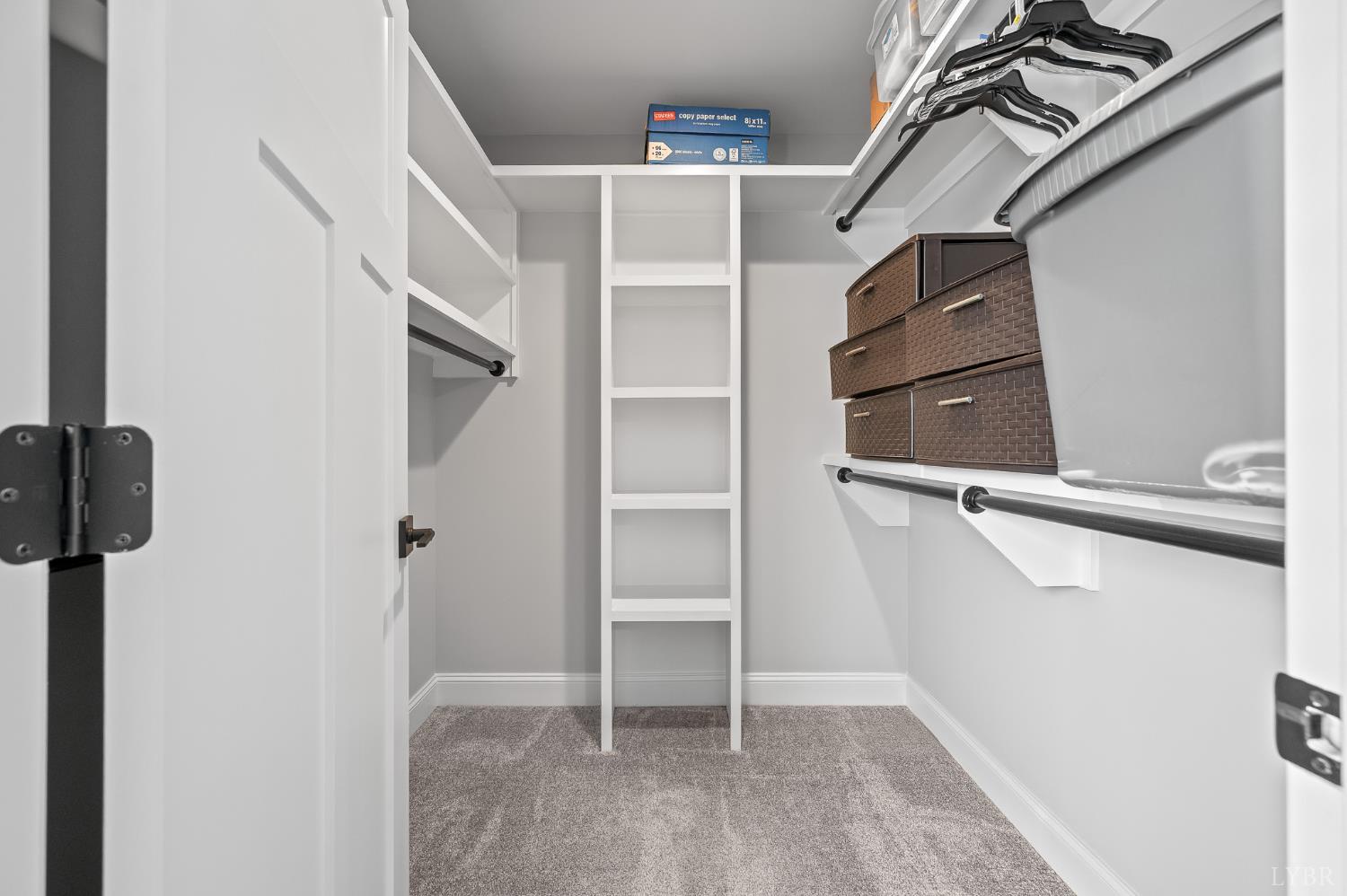 1034 North Westyn Loop Forest, VA 24551 - Photo 33 of 57 a view of walk in closet with empty racks