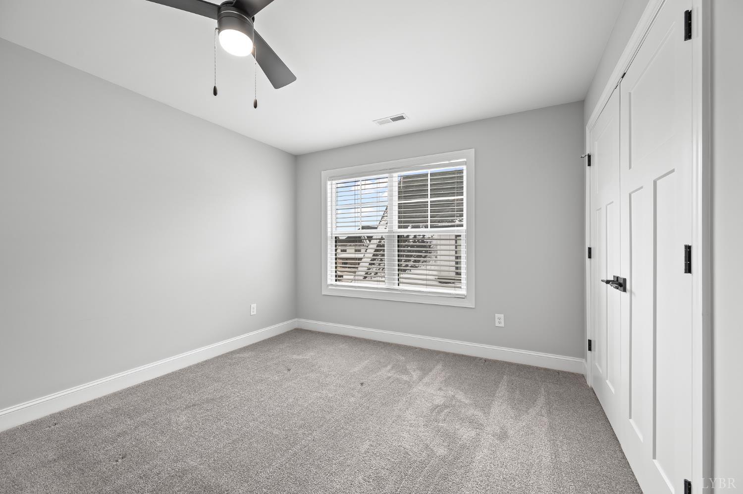 1034 North Westyn Loop Forest, VA 24551 - Photo 34 of 57 an empty room with windows
