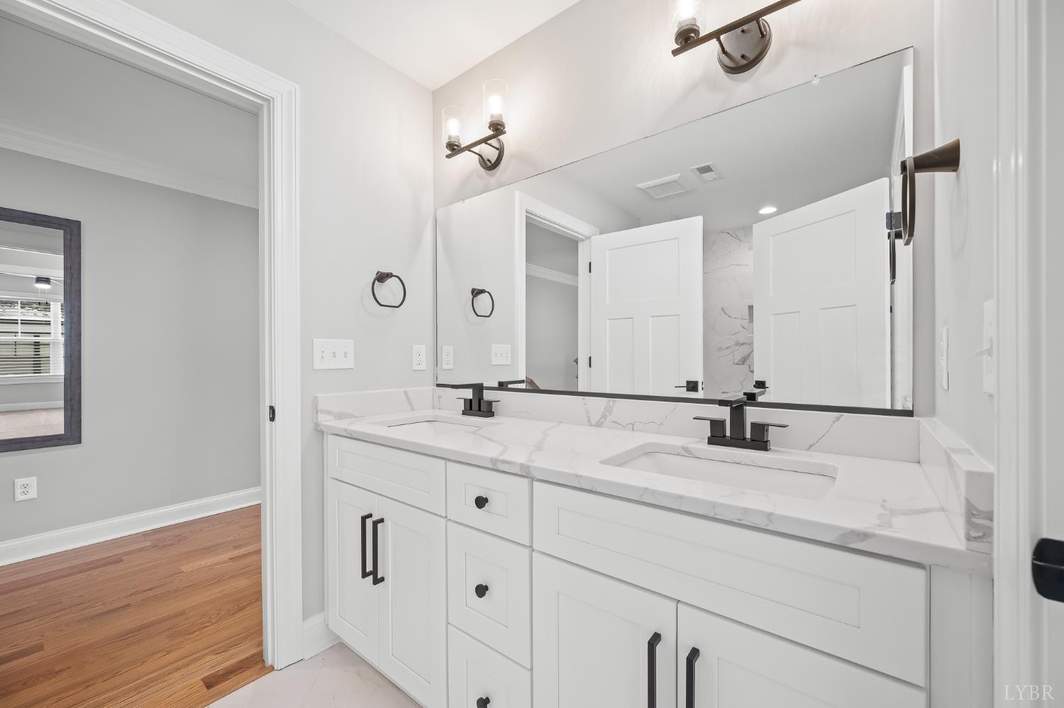 1034 North Westyn Loop Forest, VA 24551 - Photo 36 of 57 a bathroom with a granite countertop sink mirror and