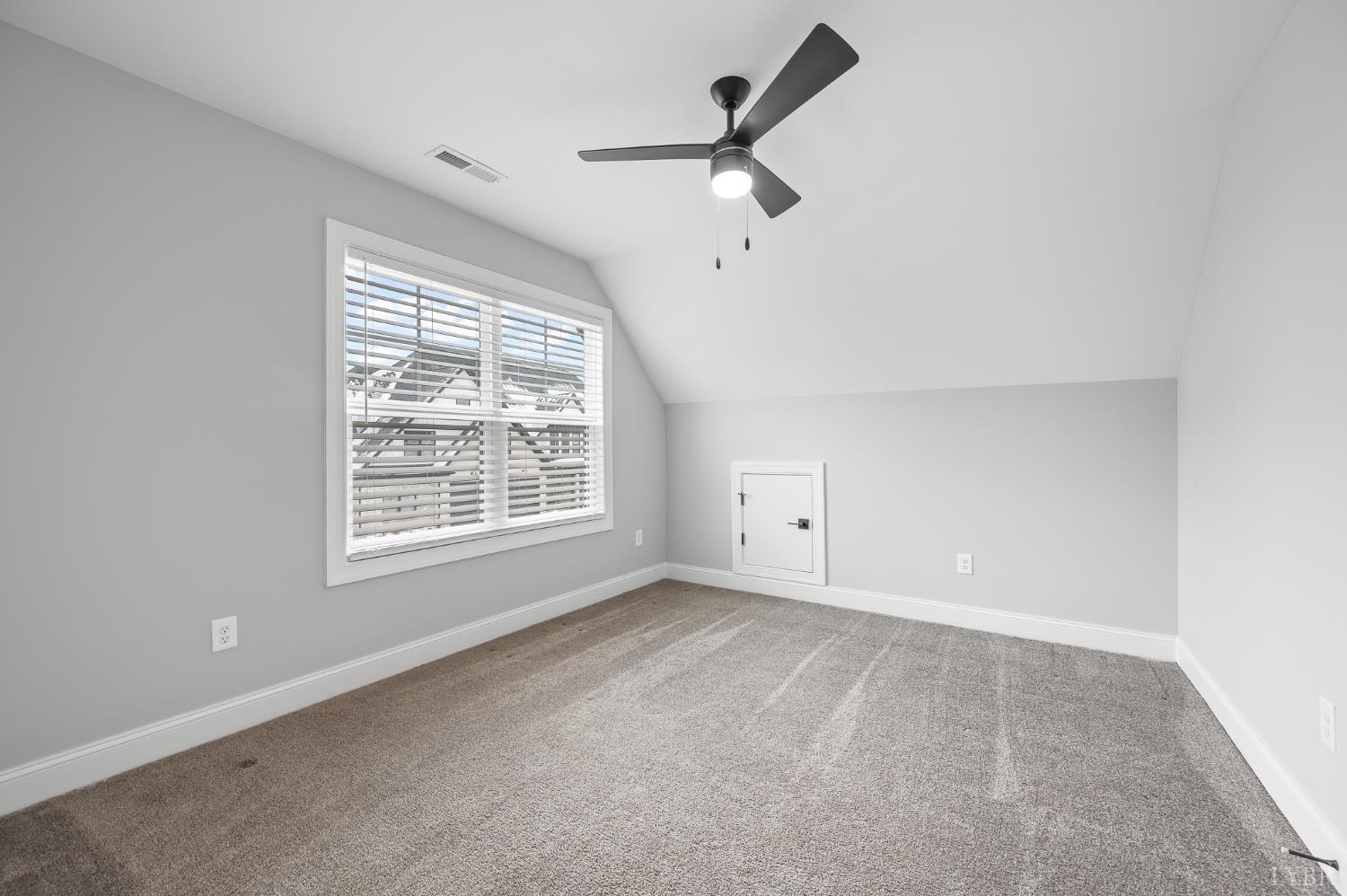 1034 North Westyn Loop Forest, VA 24551 - Photo 39 of 57 a view of a livingroom with a ceiling fan and window