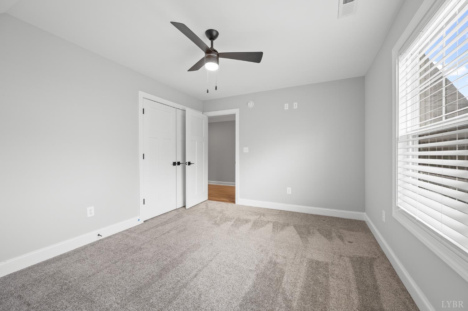 1034 North Westyn Loop Forest, VA 24551 - Photo 40 of 57 wooden floor in an empty room with a window