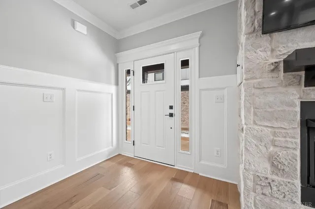 a view of a kitchen with a sink and a stove top oven