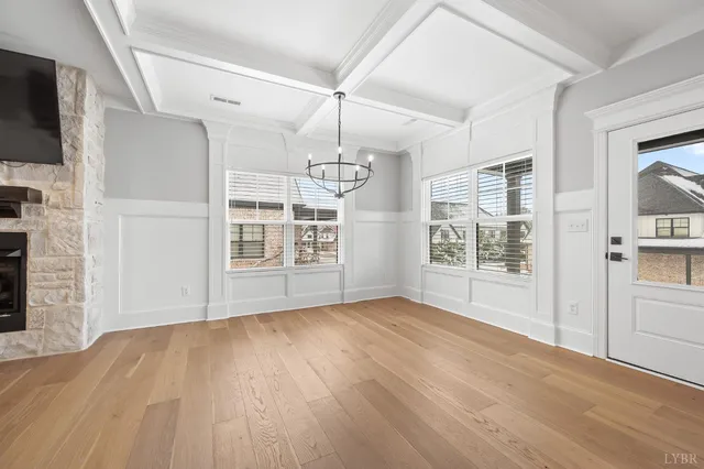 a kitchen with stainless steel appliances a refrigerator sink and cabinets
