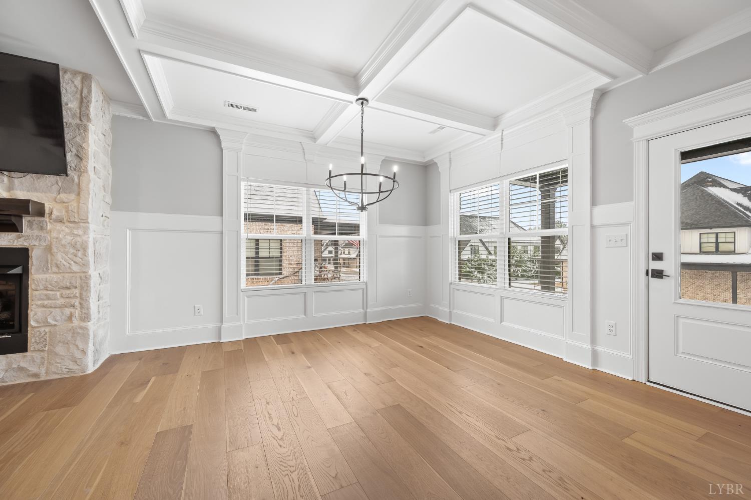 1034 North Westyn Loop Forest, VA 24551 - Photo 9 of 57 a view of an empty room with wooden floor and a window