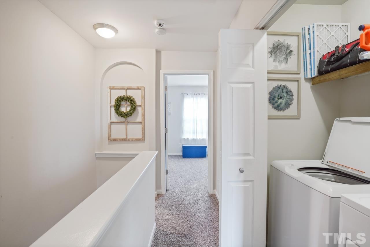 2710 Chilton Place Raleigh, NC 27616 - Photo 20 of 25 a view of hallway with washer and dryer