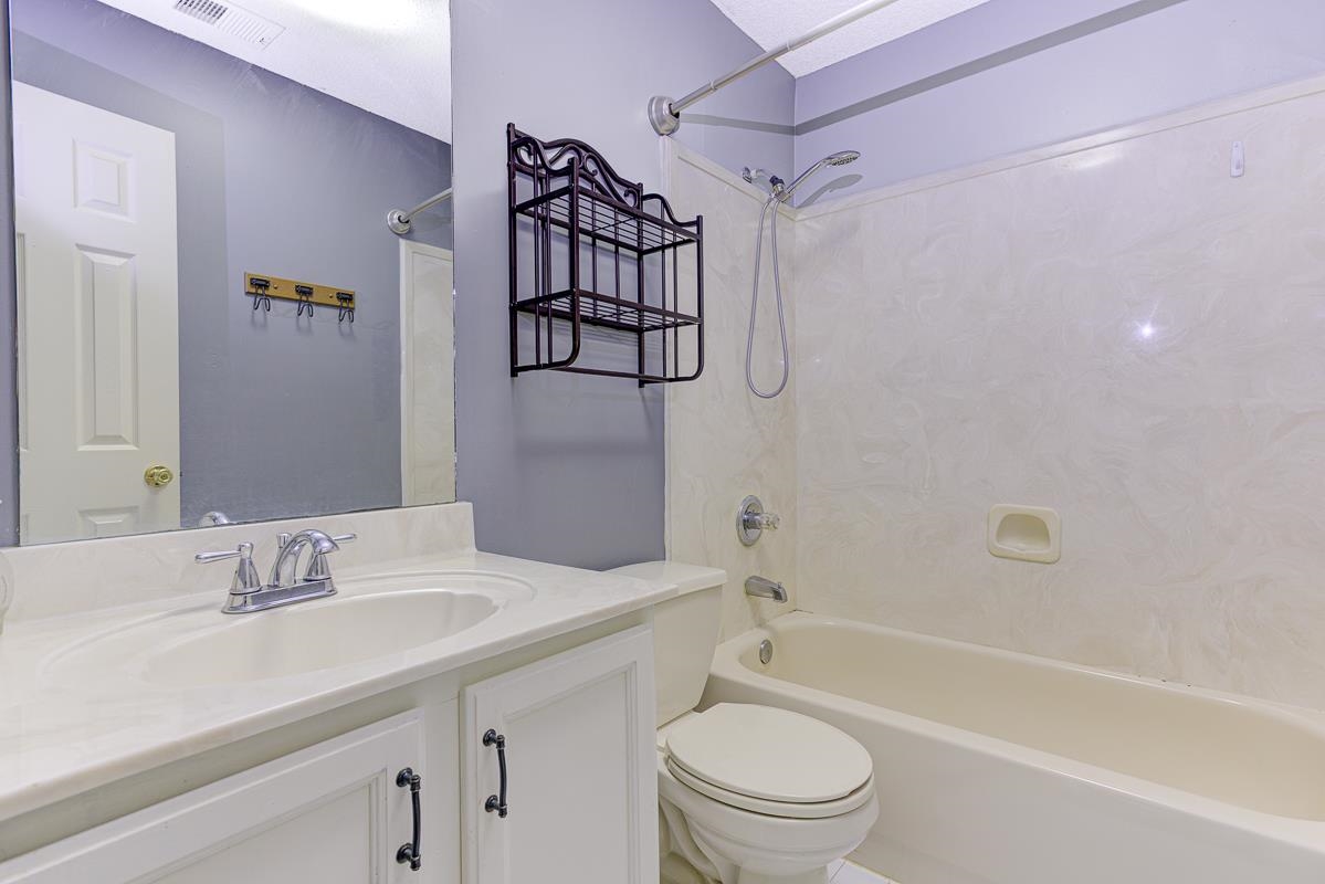 604 North Ericson Road Memphis, TN 38018 - Photo 8 of 16 Bathroom vanity with integrated sink and chrome faucet