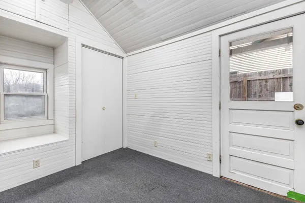 a view of backyard with green space