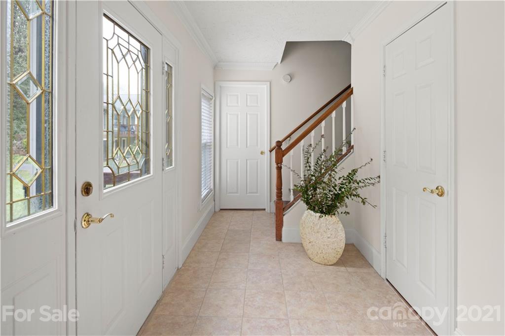 101 McFalls Road Asheville, NC 28805 - Photo 11 of 21 a view of entryway with wooden floor