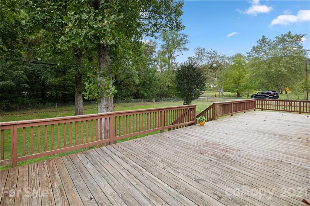 101 McFalls Road Asheville, NC 28805 - Photo 20 of 21 a view of balcony with wooden floor and outdoor space
