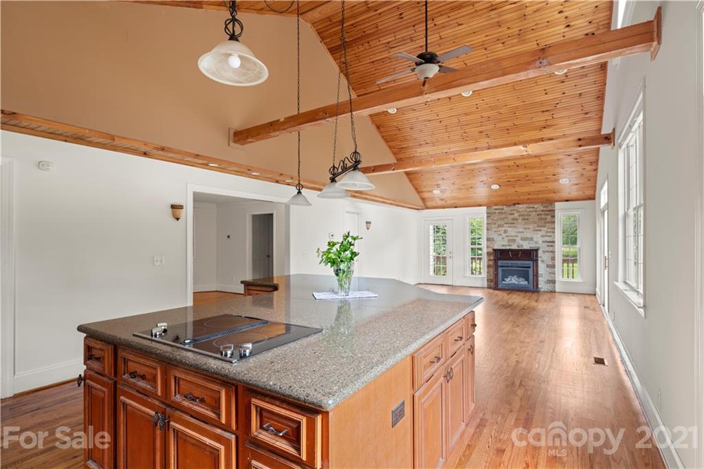 101 McFalls Road Asheville, NC 28805 - Photo 5 of 21 a kitchen with a stove and cabinets