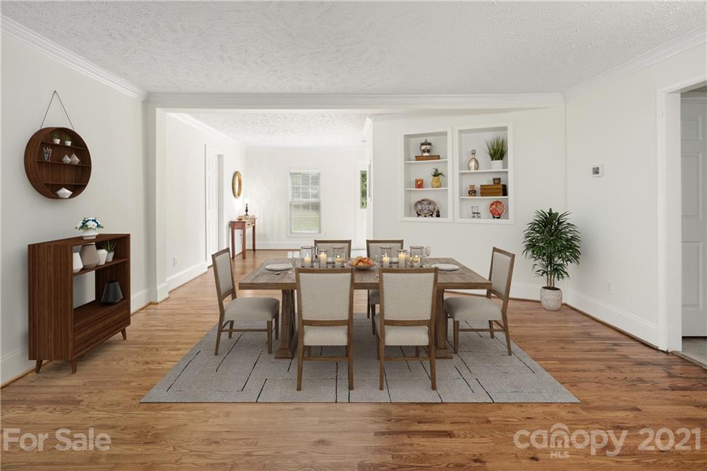 101 McFalls Road Asheville, NC 28805 - Photo 6 of 21 a view of a dining room with furniture and wooden floor