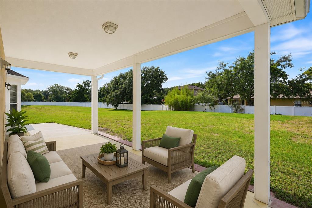 936 Kingsridge Circle Gotha, FL 34734 - Photo 3 of 50 a balcony with furniture and garden view