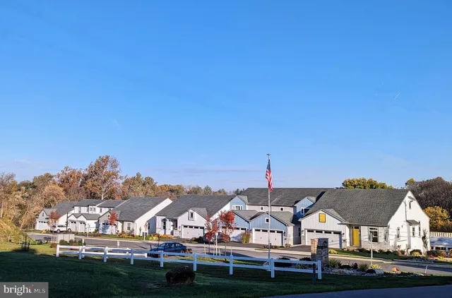 a view of large house with a big yard