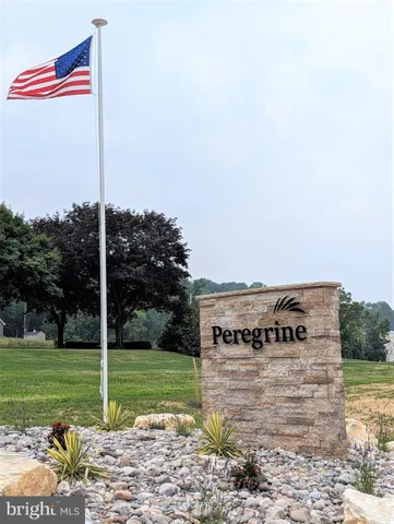 a view of a sign in front of a white house