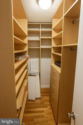 a lobby with furniture and a potted plant